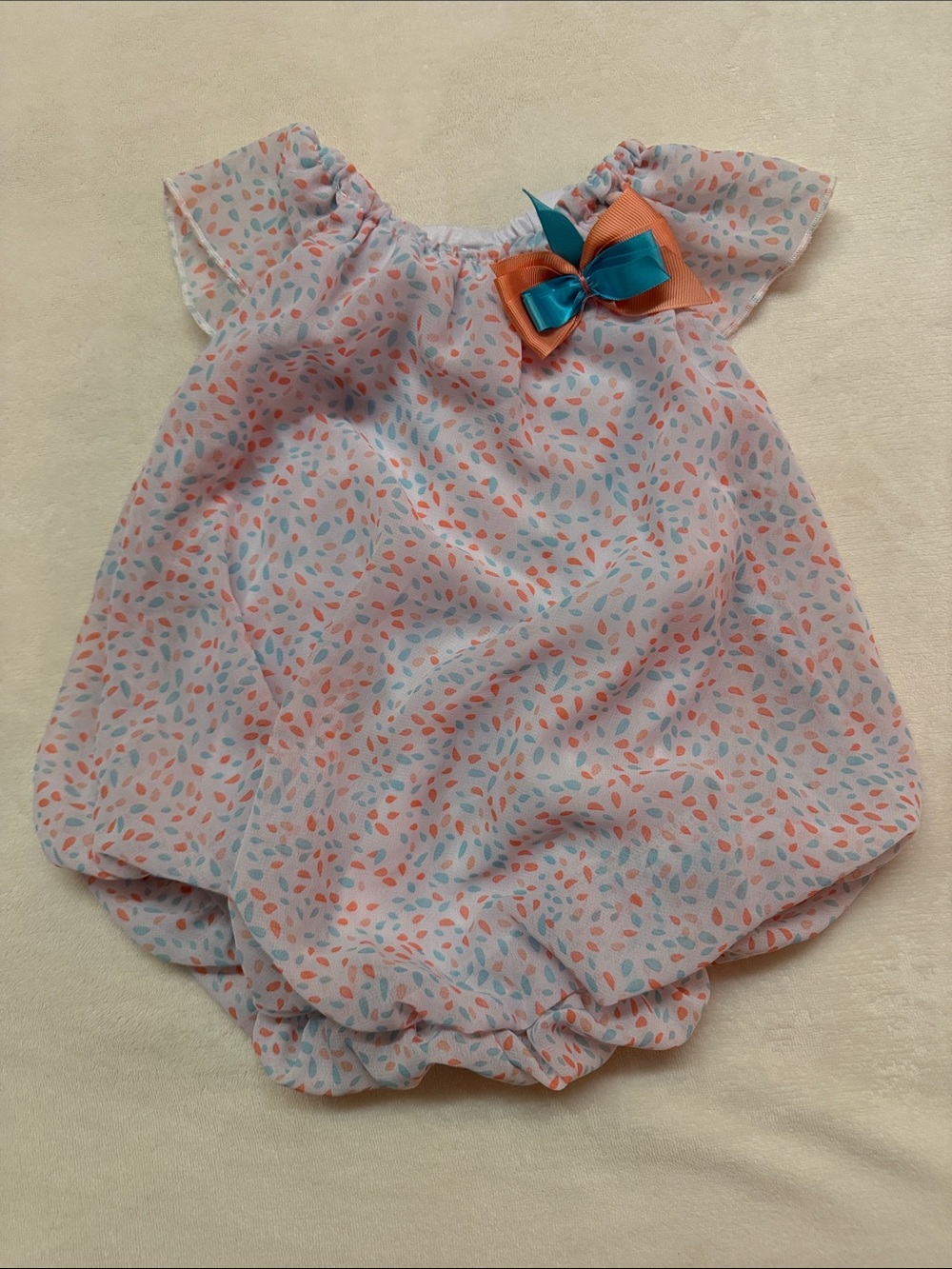 Baby Essentials White Romper with Coral & Teal Bow